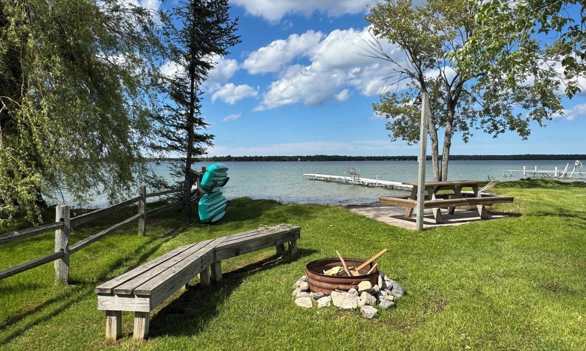 Presque Isle Cottage | 2 lakefront cottages private beach & dock.
