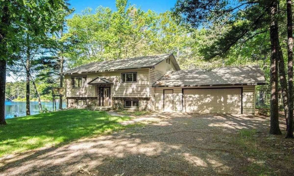 Manitowish Waters House | Fantastic waterfront abode with wraparound deck, dock, & WiFi - dog-friendly