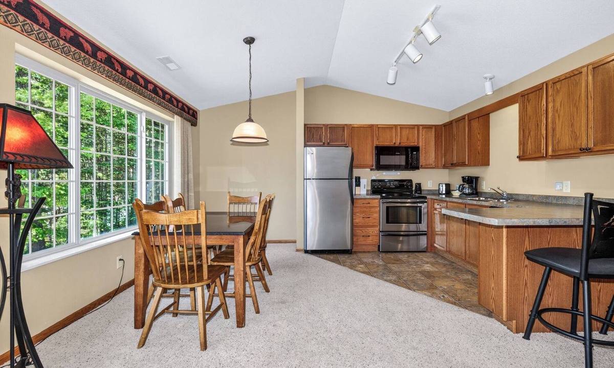 Eagle River Condo | Gorgeous Condo on Duck Lake with indoor pool and onsite volleball, tennis and fi