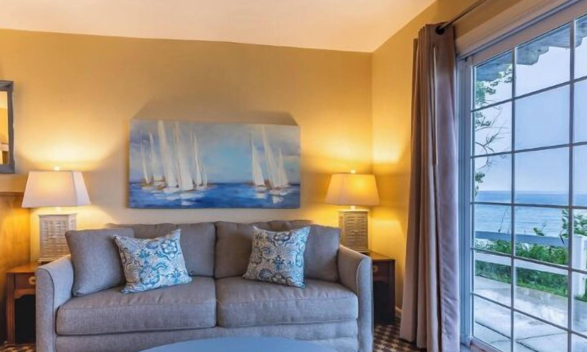 Whitehall Resort | Lakefront, king bed and sofa sleeper, ground level