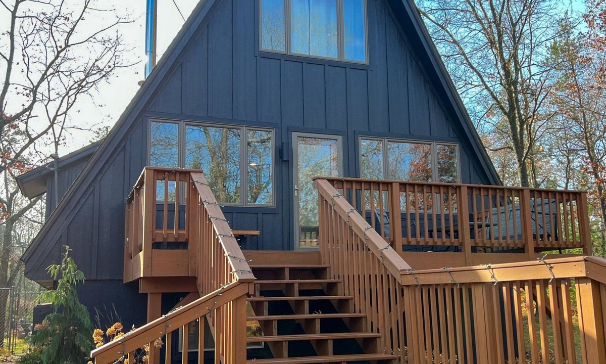 East Tawas Ski Chalet | Modern A-Frame on fenced, wooded Lot. Pet friendly!