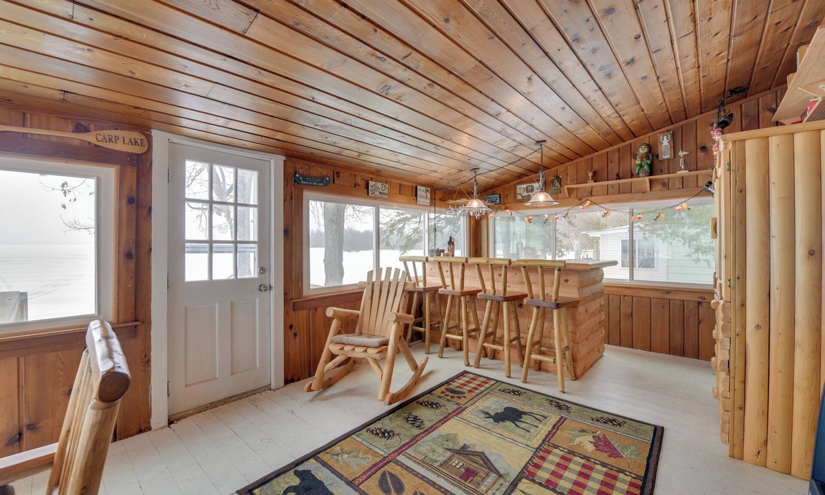 Carp Lake Cottage | Private Dock & Views! Family Home on Paradise Lake