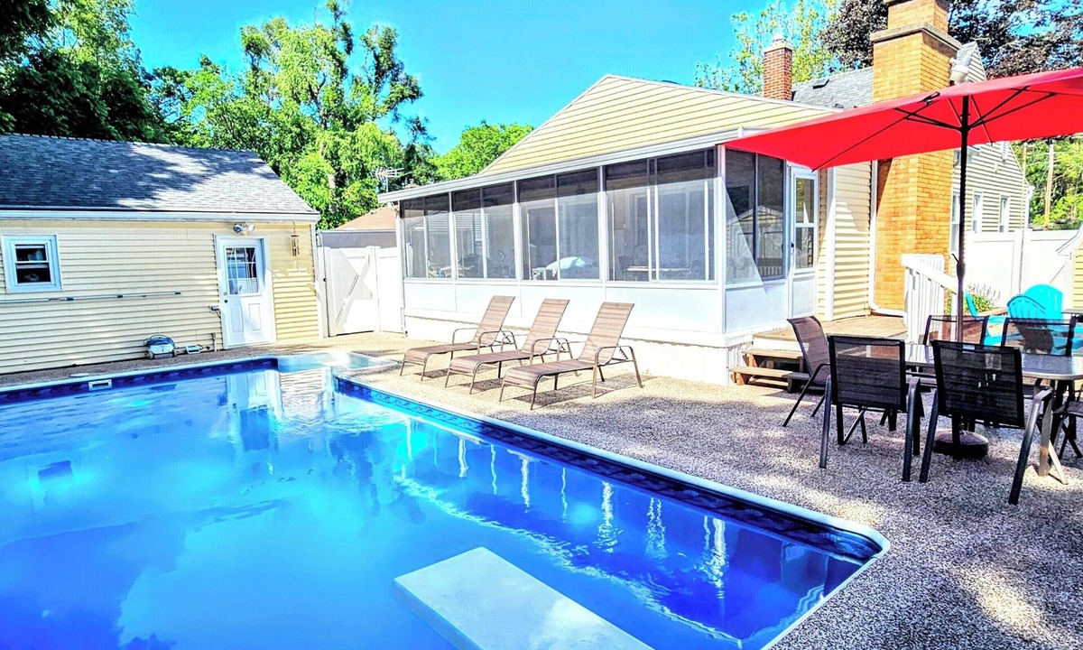 Wyoming House | Private Oasis large in-ground pool close to downtown Grand Rapids and airport.