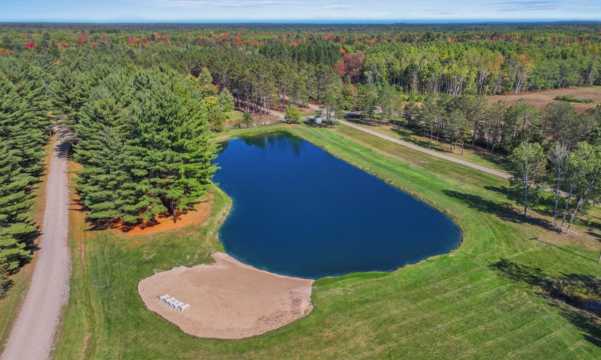 Manton Cabin | Sleeps 40- 12 Bedroom/12 Bath Lodge on 80 acres with 26' x 52' Great Room