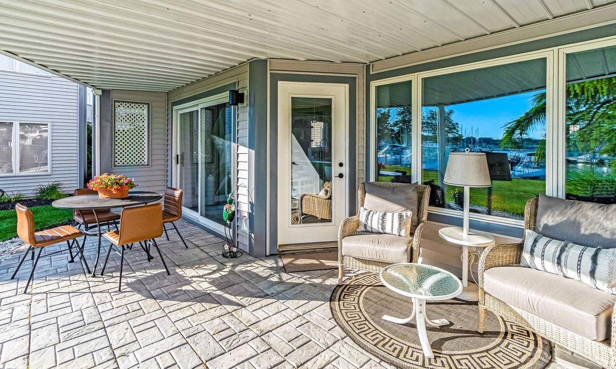 Douglas Condo | Water-view condo with private furnished patio, electric fireplace, W/D, and AC