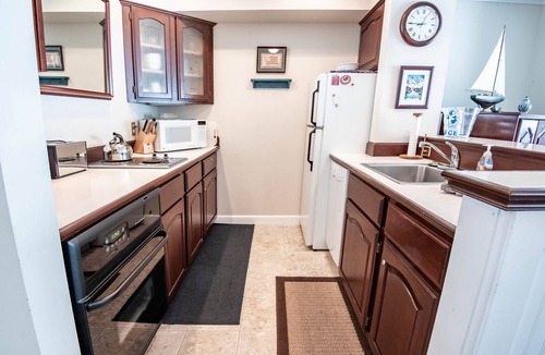 Boyne City Condo | 110 Water Street | 1BR Beachfront Condo | Lake Charlevoix