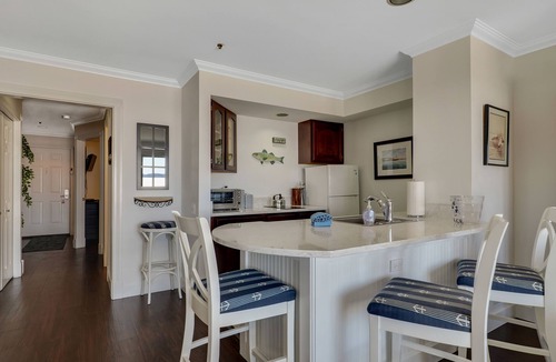 Boyne City Condo | 114 Water Street | Private Patio on Lake Charlevoix | Ground Floor Getaway