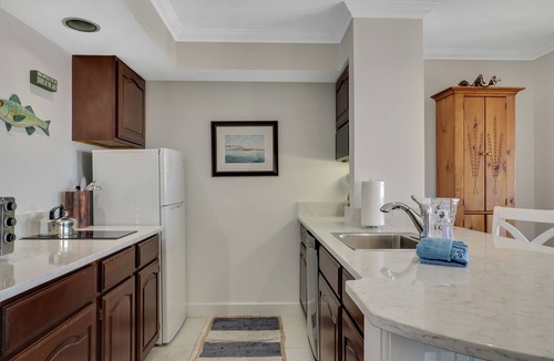 Boyne City Condo | 114 Water Street | Private Patio on Lake Charlevoix | Ground Floor Getaway