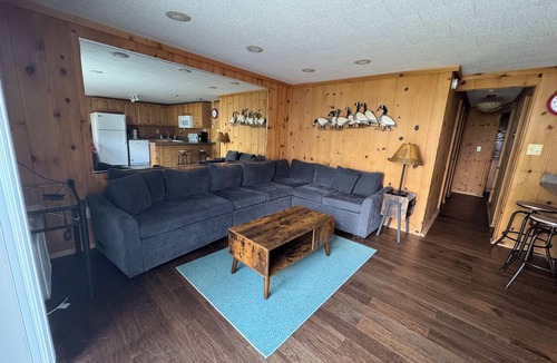 Presque Isle Cottage | 2 lakefront cottages private beach & dock.