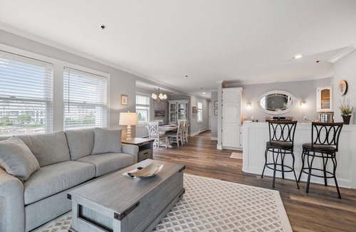 Boyne City Condo | 215 Water Street | Balcony Over Lake Charlevoix | Waterfront Stay | Fireplace