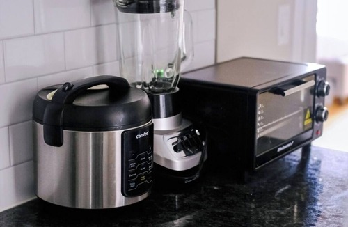 Irving Park East Apartment | 2BR Fitness Pad Private Gym Sleeps 7