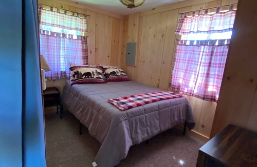 Presque Isle Resort | 3 lakefront cottages private yard and beach with dock.