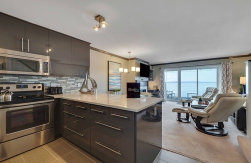 Boyne City Condo | 311 Water Street | Condo with Lake Charlevoix Views | Private Beach Access