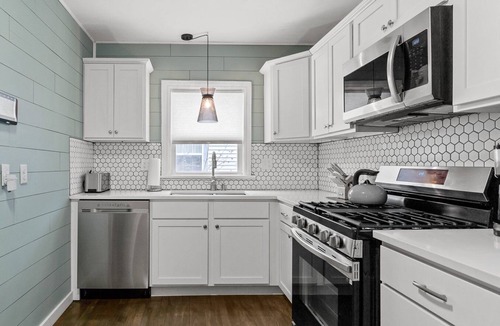 Muskegon House | Blue Paw Retreat | Pet Friendly Stay Near Lake Michigan Beaches & Golf