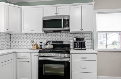 Muskegon House | Blue Paw Retreat | Pet Friendly Stay Near Lake Michigan Beaches & Golf