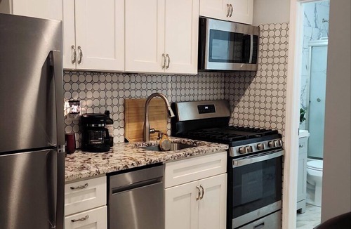 Rogers Park Apartment | Chicago Lakefront Vacation Rental · Fire Pit Patio · Loyola Beach