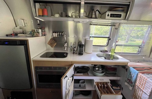 Morris House | Cozy 1-bedroom Bambi Airstream on a 56 acre farm with stream and woods.