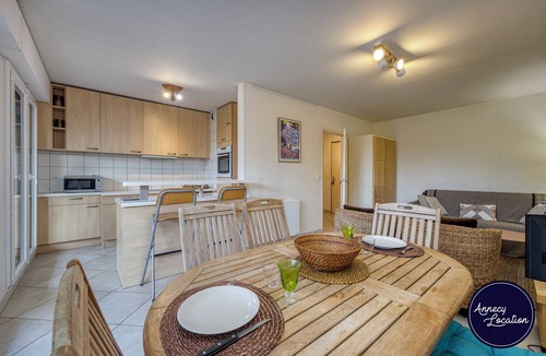 Menthon-Saint-Bernard Apartment | Discover Le Petit Menthon, a charming ground-floor apartment located in a quiet and green residence in the heart of Menthon-Saint-Bernard.