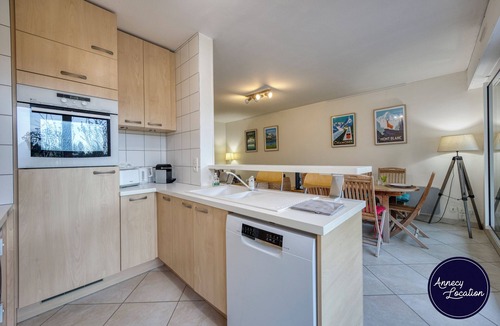 Menthon-Saint-Bernard Apartment | Discover Le Petit Menthon, a charming ground-floor apartment located in a quiet and green residence in the heart of Menthon-Saint-Bernard.