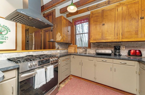 Fennville House | Discover the charm of Pier Cove Parsonage, a cozy 2-bedroom retreat in Fennville, MI.