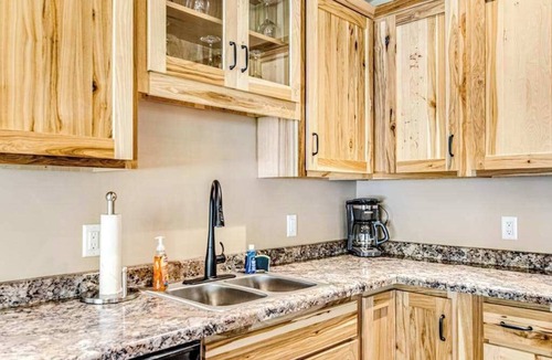 Conover House | Dog-friendly cabin with hot tub, fireplace, patio, grill, central AC, & W/D