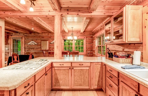 Presque Isle House | Dog-friendly, lakefront home with a wood fireplace, decks, dock, & AC