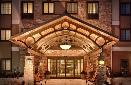 Omaha Condo | Free Breakfast. Pool. Gym. Near the Children’s Hospital!