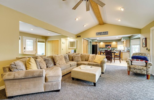 Commerce Township House | Game Room & Fire Pit: Canal-Front Commerce Home