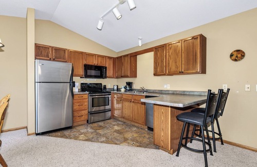 Eagle River Condo | Gorgeous Condo on Duck Lake with indoor pool and onsite volleball, tennis and fi