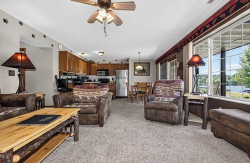 Eagle River Condo | Lake front condo on Eagle River Chain of Lakes with Indoor Pool!