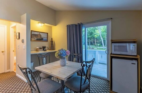 Whitehall Resort | Lake views King bedroom with queen sofa sleeper