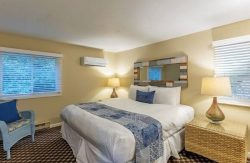 Whitehall Resort | Lake views King bedroom with queen sofa sleeper