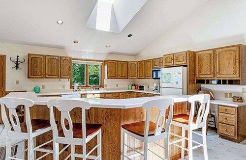 Manitowish Waters House | Lakefront, Dog-Friendly Home with Lake View, Dock, Central AC, & Wood Fireplace
