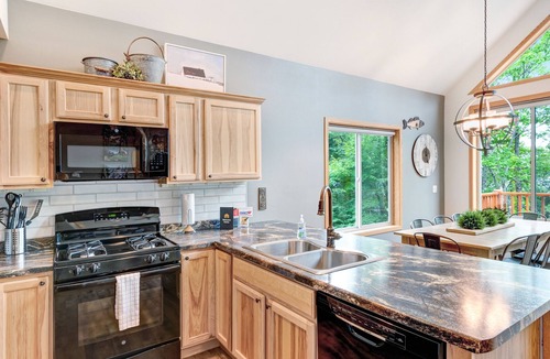 Presque Isle House | Lakefront home w/furnished deck, firepit & private dock - dogs OK