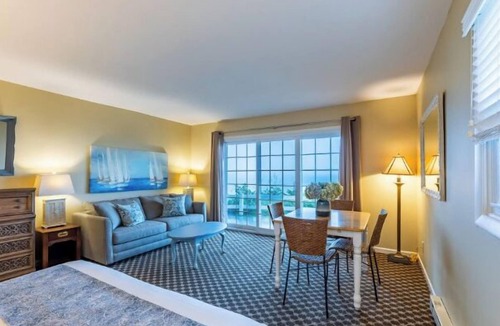 Whitehall Resort | Lakefront, king bed and sofa sleeper, ground level