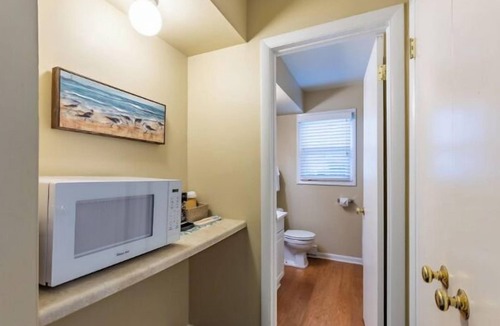 Whitehall Resort | Lakefront, king bed and sofa sleeper, ground level