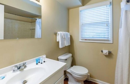 Whitehall Resort | Lakefront, king bed and sofa sleeper, ground level