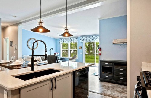 Brussels Cottage | Lakefront Paradise: Hot Tub, Kayaks & Family Fun in Wisconsin