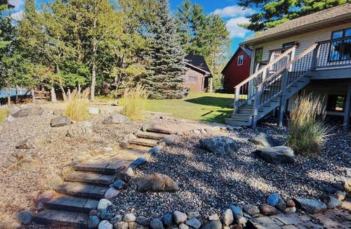 Eagle River Cabin | Lakeside Retreat on Eagle River Chain of Lakes. Walk to Downtown Sleeps 14–16