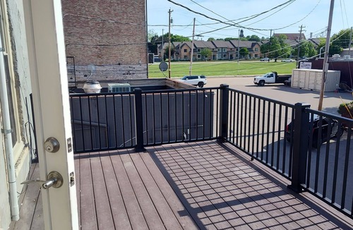 Oshkosh Apartment | Lovely 2nd floor apartment with private rooftop deck near the river on S Main