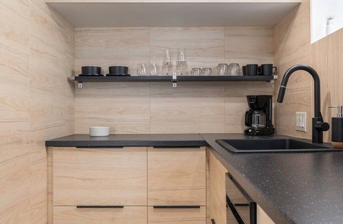 Aksarben - Elmwood Park Apartment | Luxury King Studio with Hot Tub & Heated Floors!