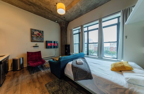 Near South Side Hotel | McCormick Place Modern Suite for 4, with Optional Parking