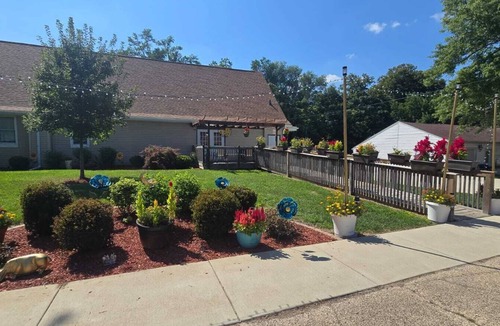 Groveland House | Medley Manor Resort Sleeps over 65 , it has 7 Large bathrooms & game room!