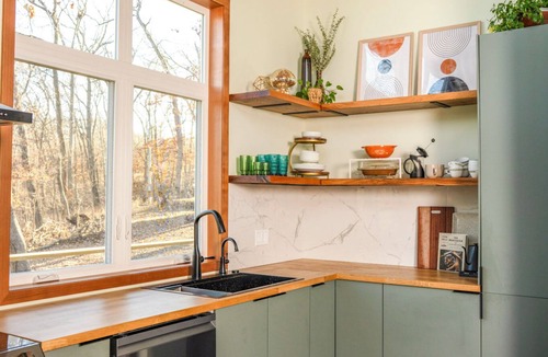 Guthrie County Cabin | Modern Cabin w/Hot Tub + Fire Pit + Private Trails