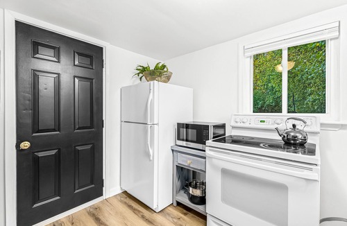 Plymouth House | Modern Farmhouse Bungalow with Firepit! King Bed + Walk to Downtown