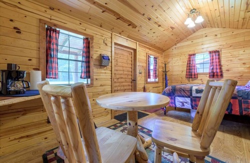 Hartford RV Rental | NEW! Wooded Acres Resort - 2 Small Cabins Plus Separate Building with 2 Bathrooms! Includes A/C and Heat! Dog-friendly with Tents Allowed!