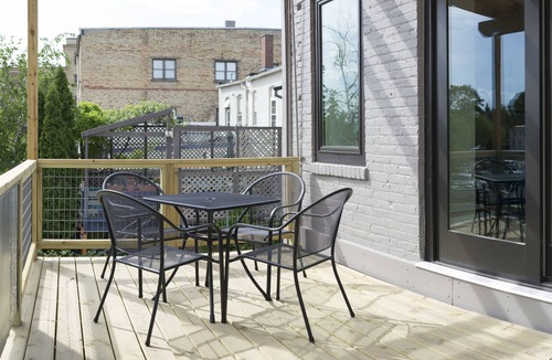 Grand Haven Condo | Newly Renovated Downtown Condo In Historic Fortino's Building