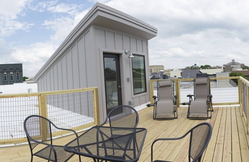 Grand Haven Condo | Newly Renovated Downtown Condo In Historic Fortino's Building