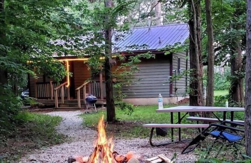 Triumph Cabin | Osage cabin, sleeps 4 at Kishauwau Cabins near Starved Rock- no animals allowed
