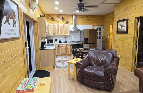 Irons Cabin | Peaceful 2-bedroom cabin with AC in charming Irons, hot tub, sauna, covered deck